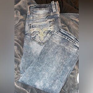 Men’s rock revival faded jeans in great condition